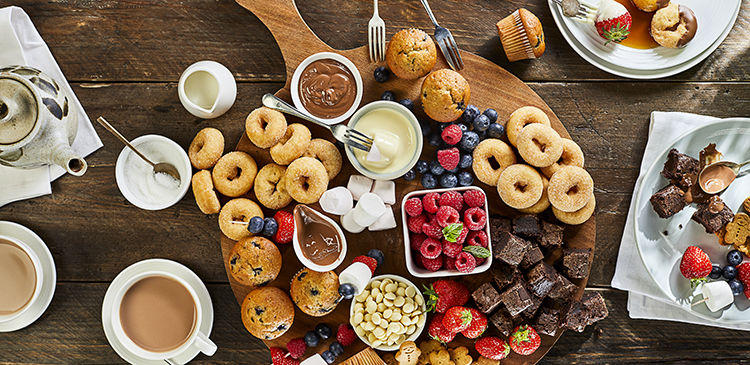 Sweet Grazing Board with donuts, brownies, fruit and choclate